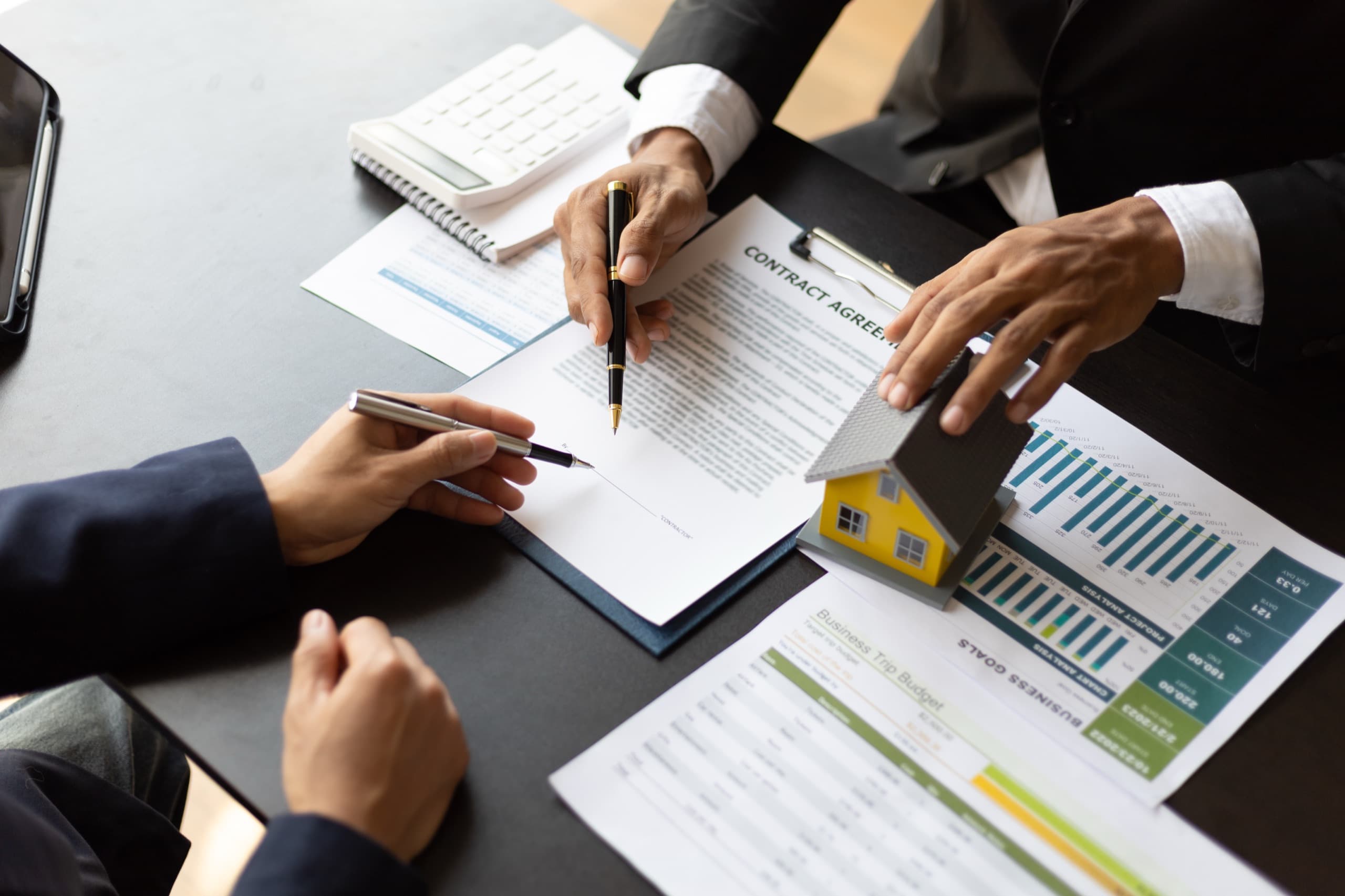 Owner reviewing a property management agreement